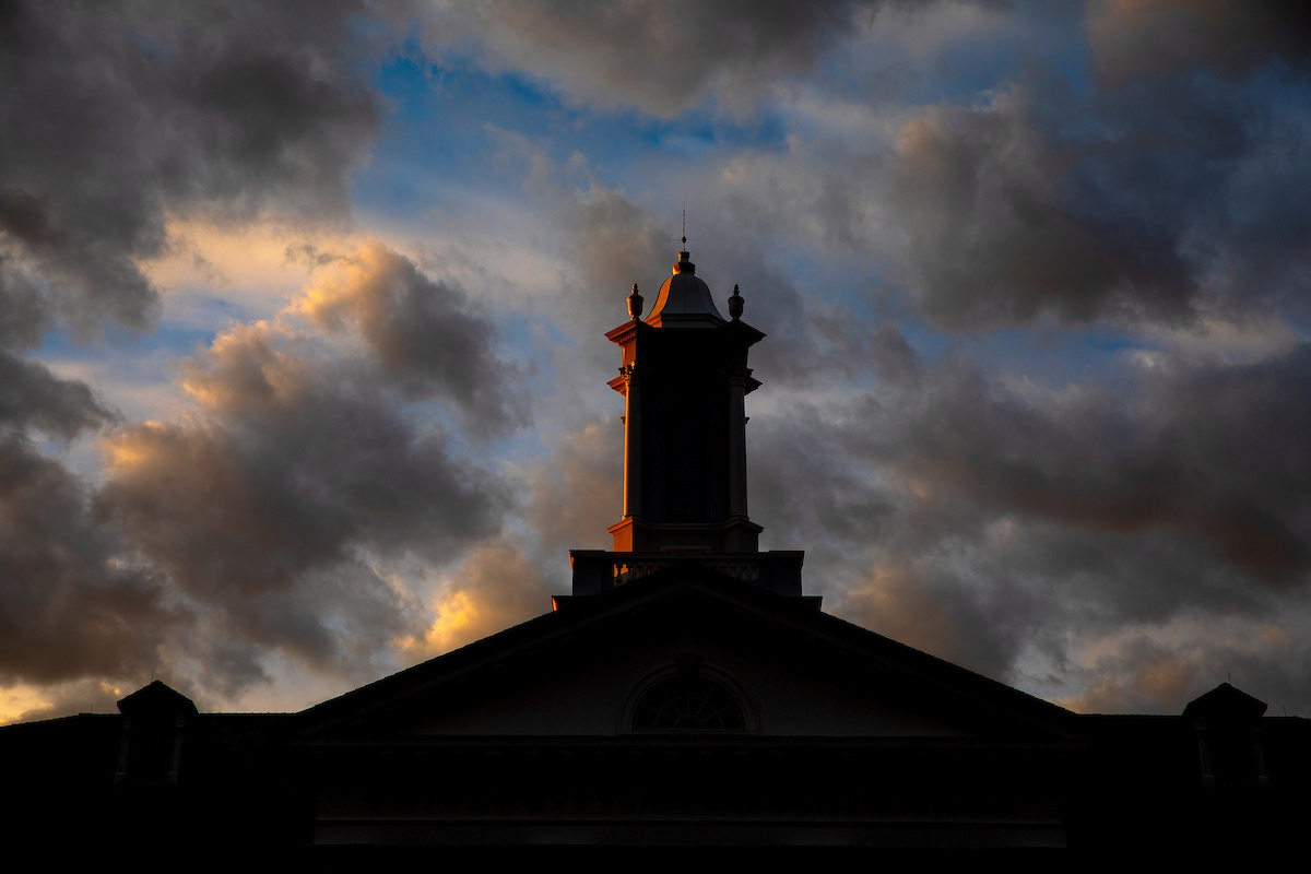 The UNO Arts and Sciences Hall with sunlight on one side.