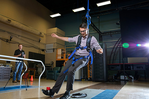 a man works in the biomechanics lab at uno