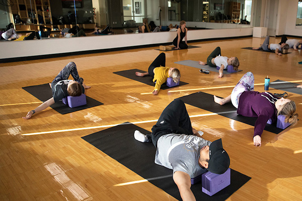 students in a yoga class