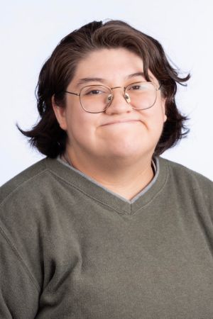Headshot of staff member, Jules Flores