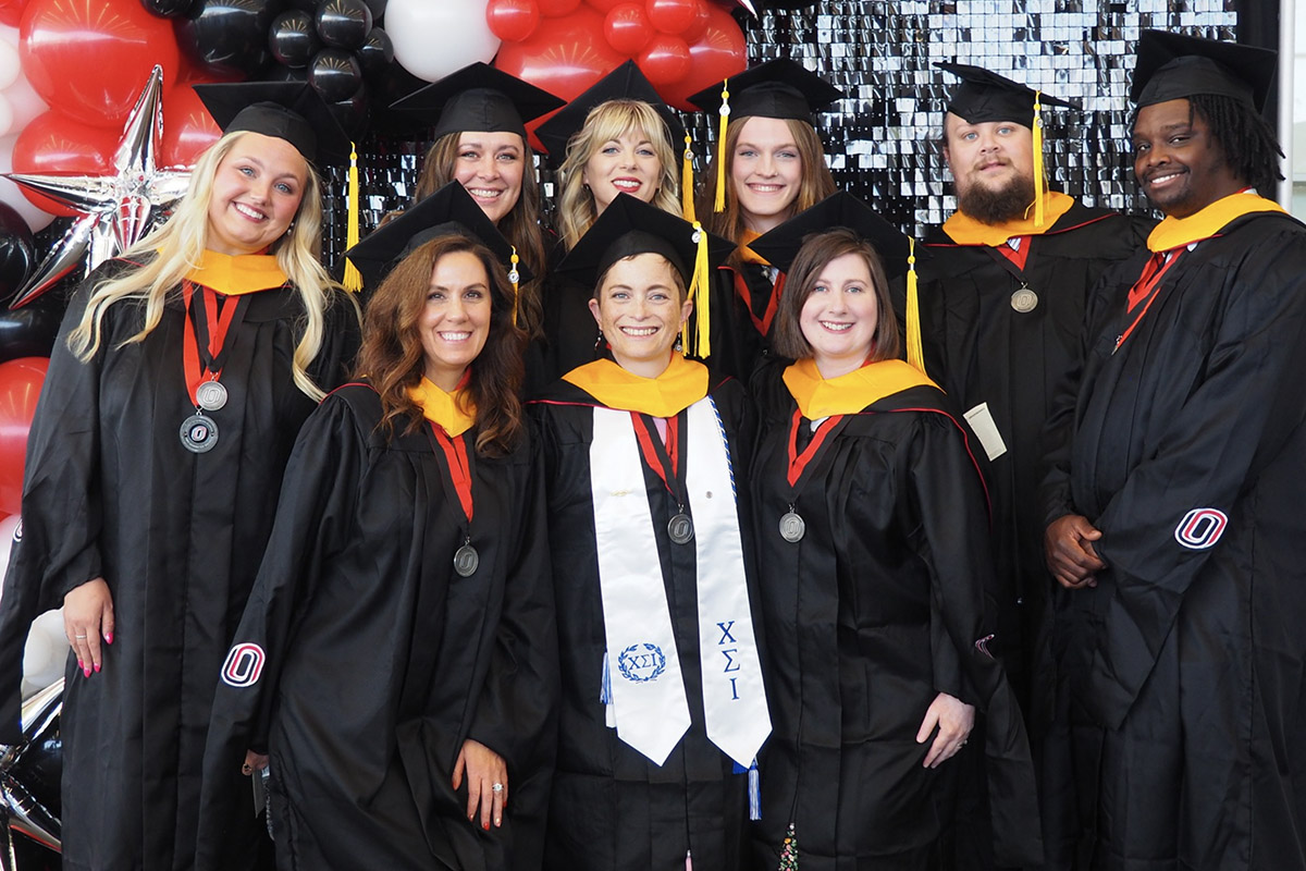 A group of people at a graduation ceremony