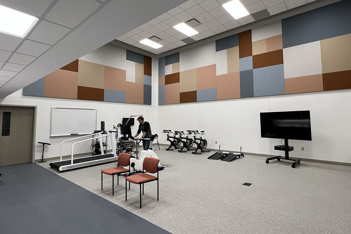 A researcher works in the new lab space in the Health Science Collaborative 