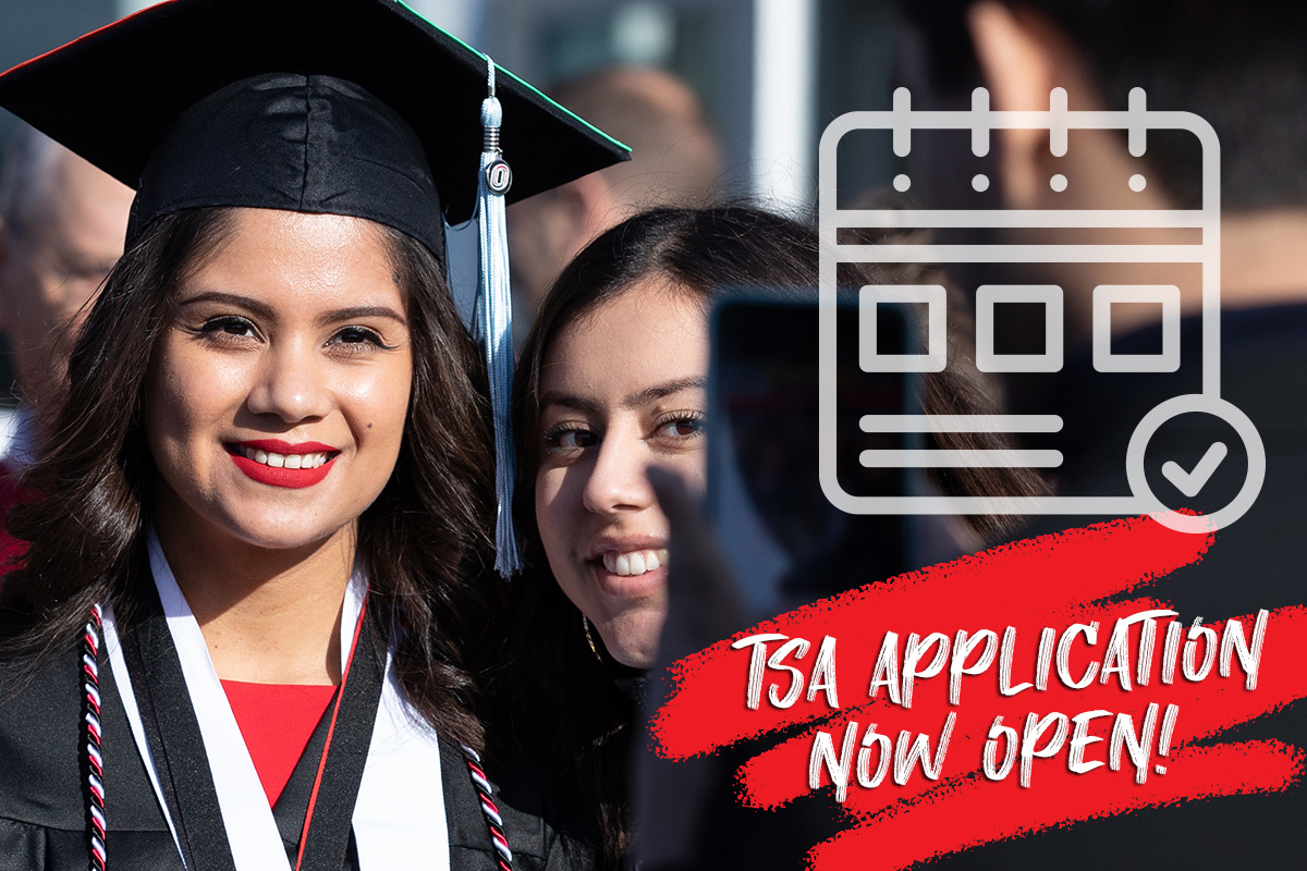 A new graduate poses for a photo with a family member at a recent UNO Commencement Ceremony; text on image reads: TSA Application Now Open!