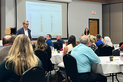 Director Josie Gatti Schafer presenting at the Nebraska Department of Economic Development 6 Regions, One Nebraska Western Region meeting