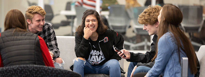 students sitting together laughing