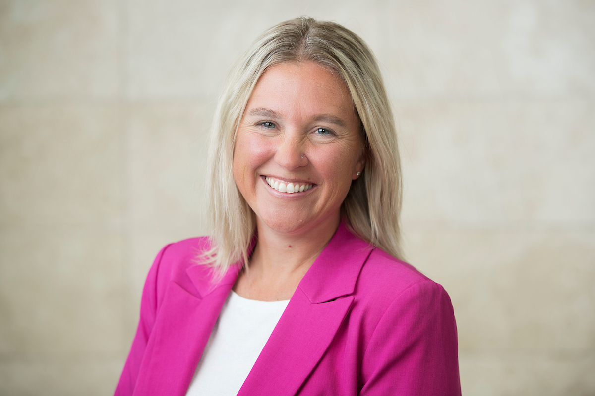 a woman, jaci lingburg, smiling at the camera