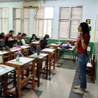 Fulbright scholar teaching students in a classroom