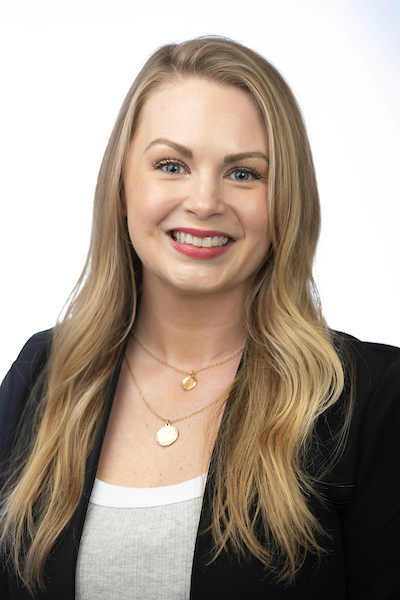 Headshot of Stephanie Larson smiling at the camera