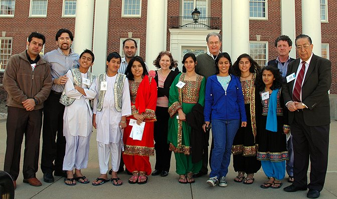 Thomas Gouttierre greeting an Afghani girl