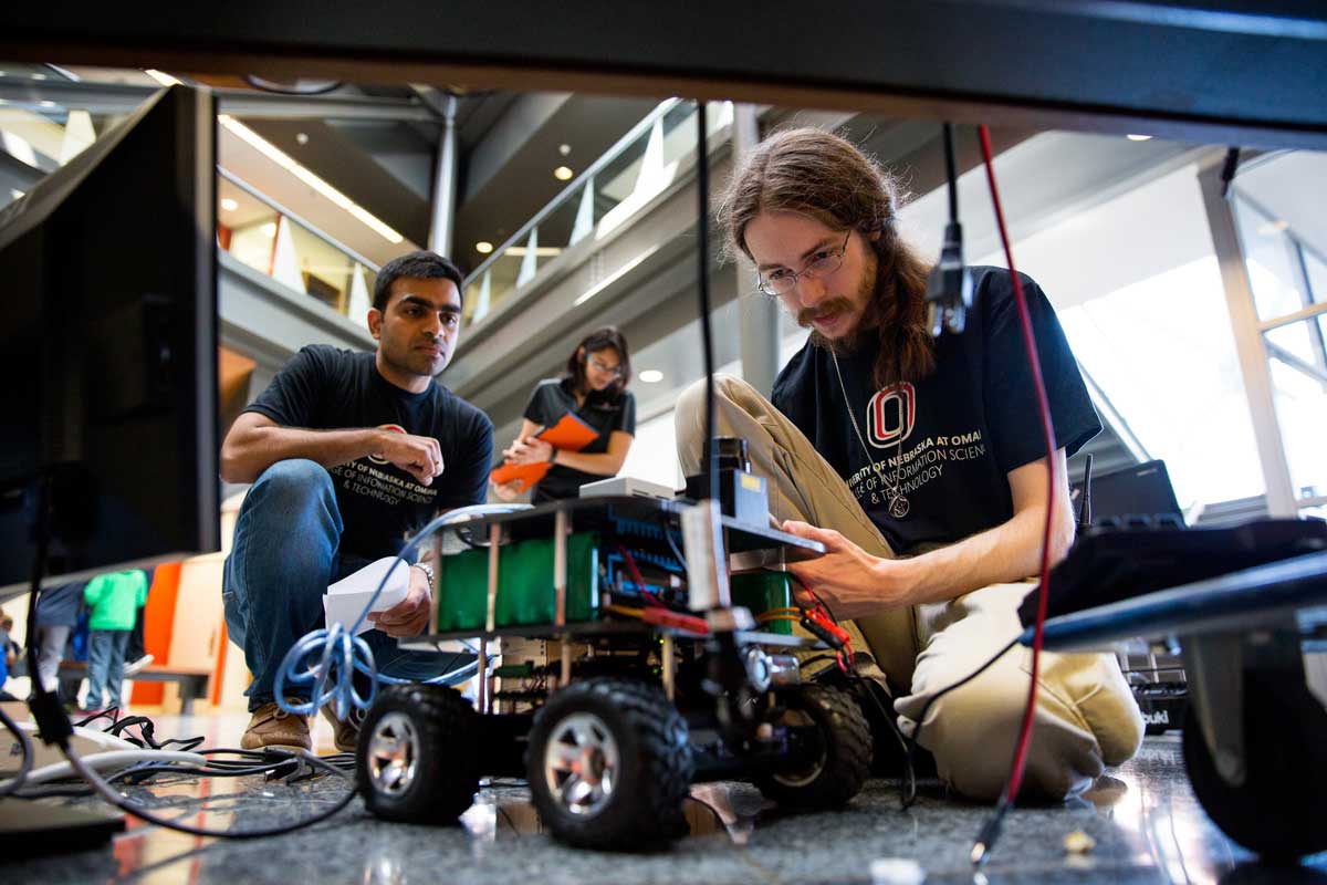 College of IS&T students test out their latest robot.