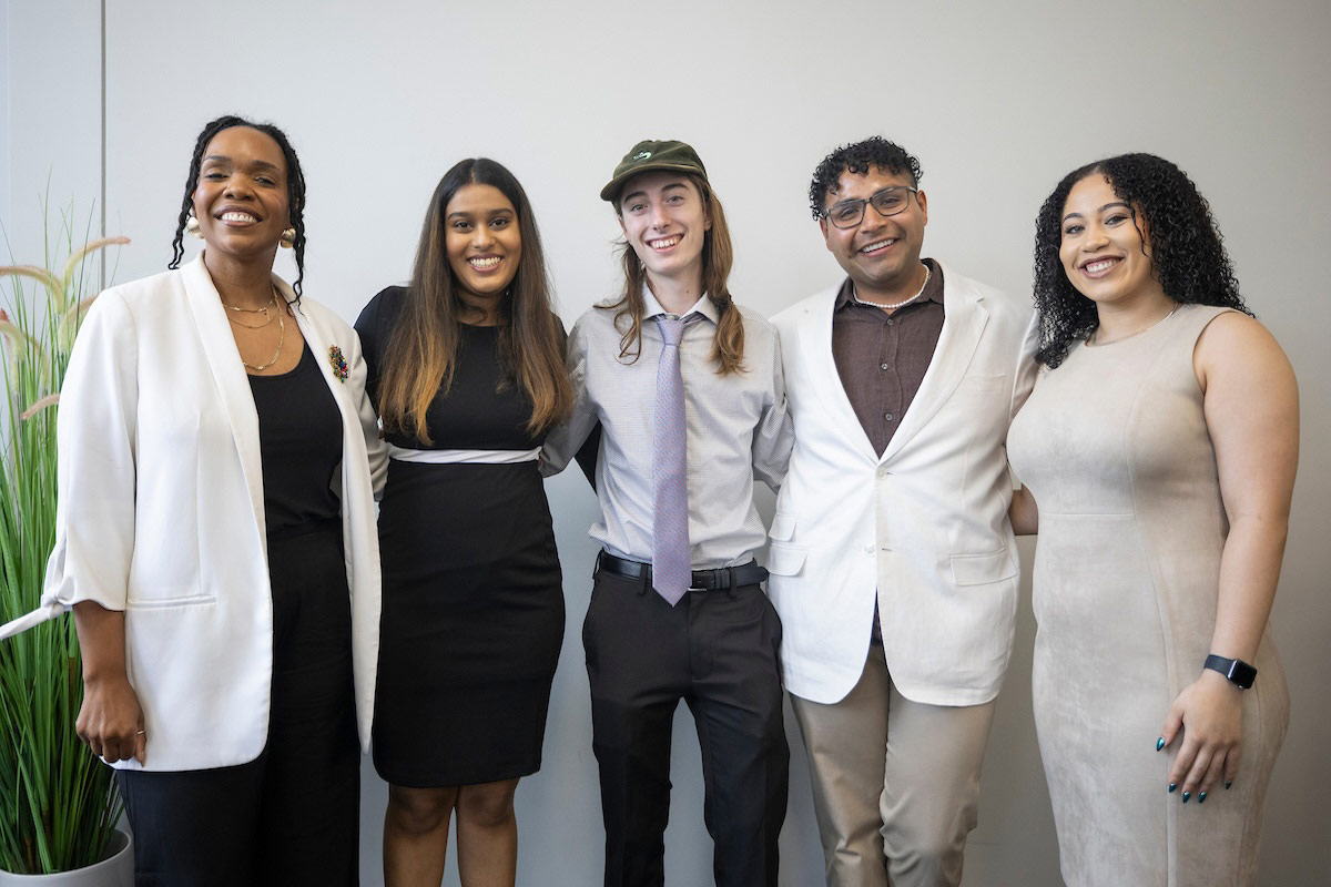 The newly sworn in student government officers take a photo with Taricka Burton and Sierra Roseby at the Student Government Swearing In Ceremony in Milo Bail Student Center. 