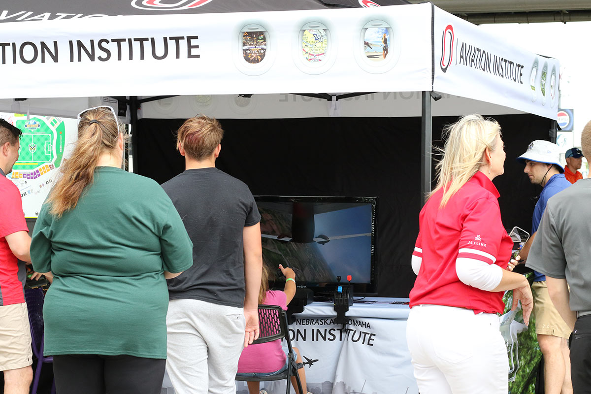 Fans stop by the flight simulator