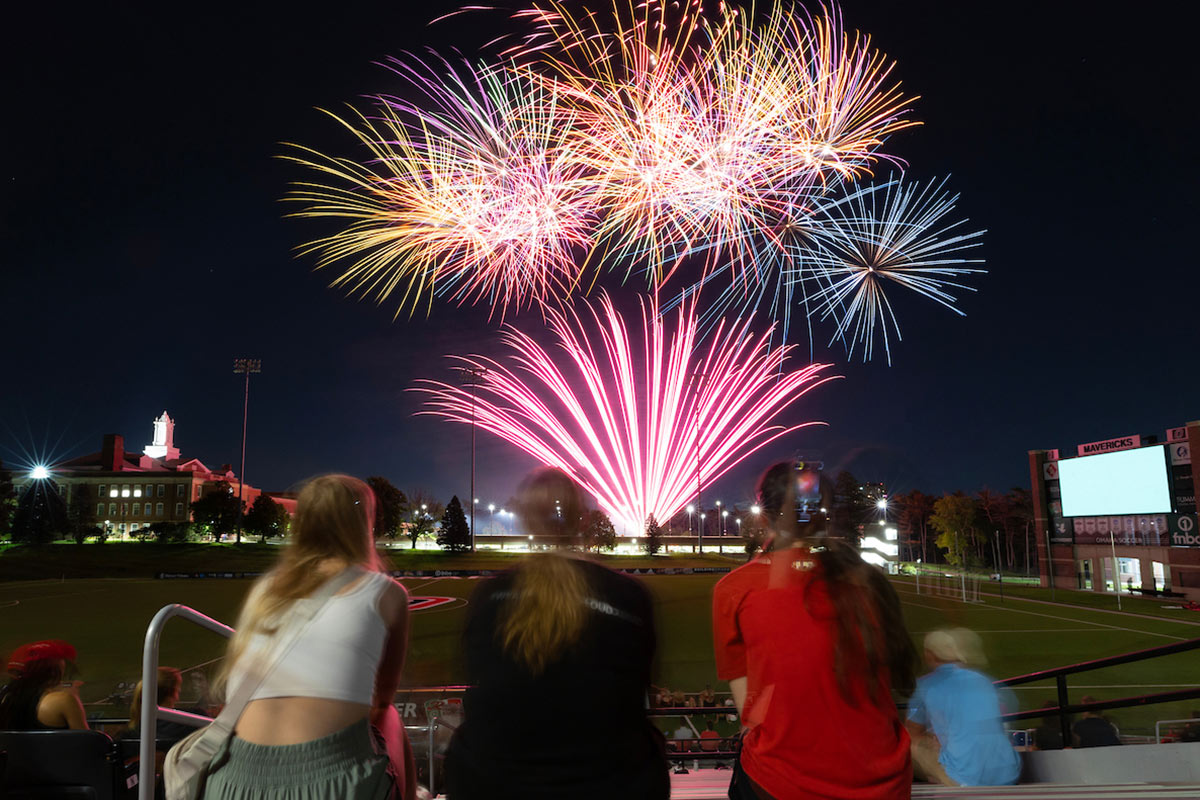 Students watching fireworks at the end of Convocation