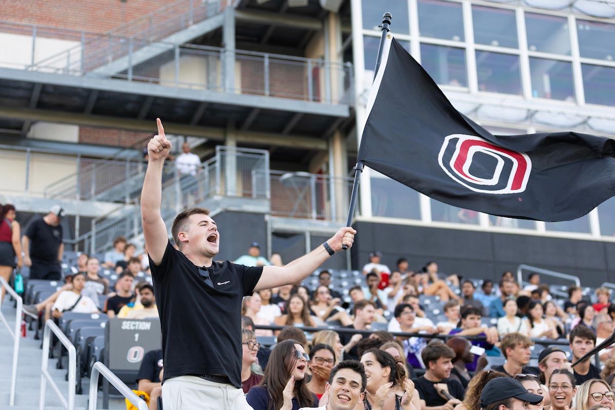 UNO students cheer on their fellow Mavericks during a men's soccer game at Caniglia Field on UNO's Dodge Campus. 