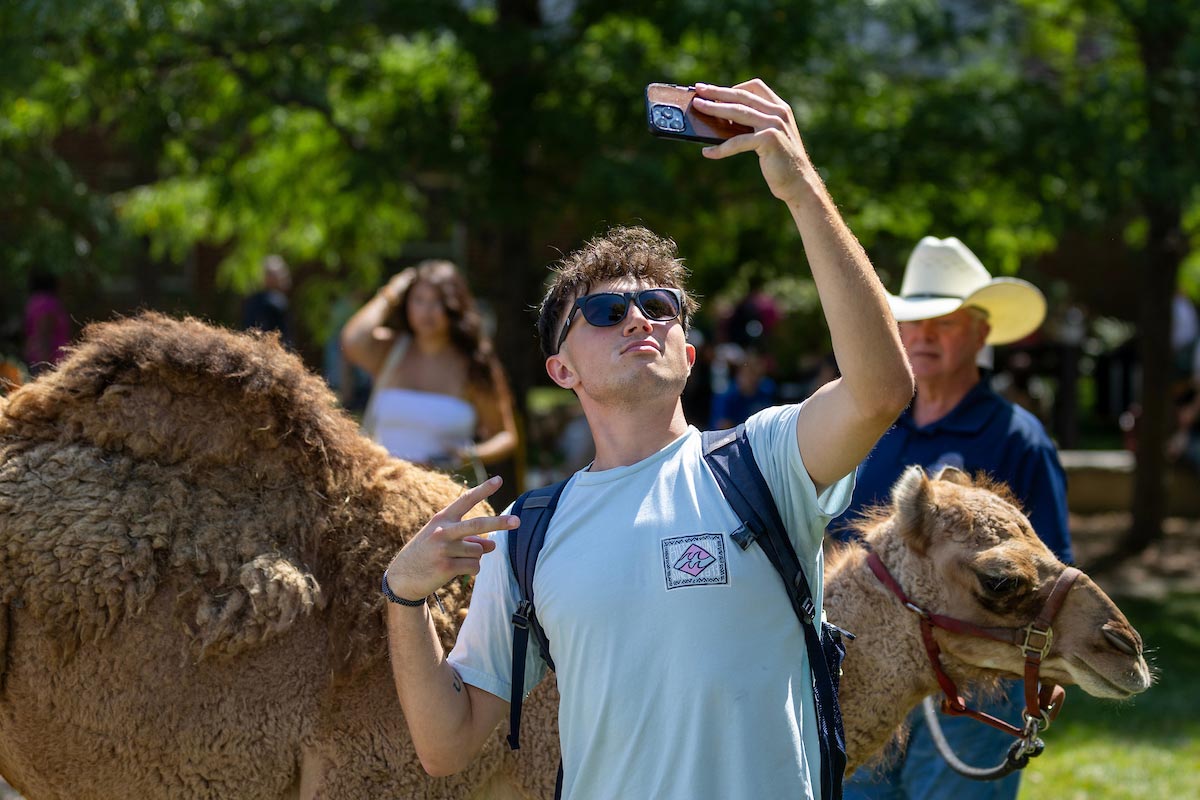 UNO students posed for a photo taken with a camel on UNO's Dodge Campus during Durango Days.