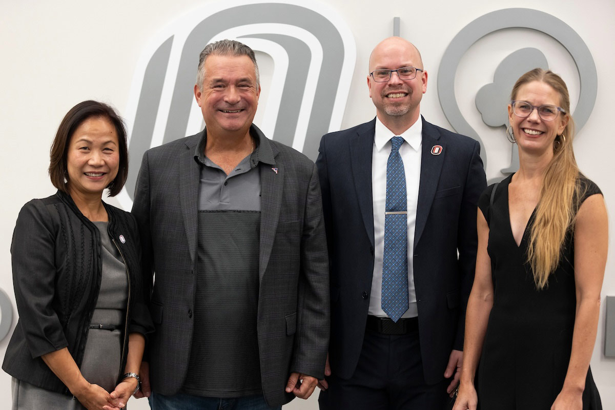 UNO Chancellor Joanne Li, Ph.D., U.S. Rep. Don Bacon, Director of the STEM Trail Center Chris Moore, Ph.D., and Omaha-based artist Lee Emma Running.