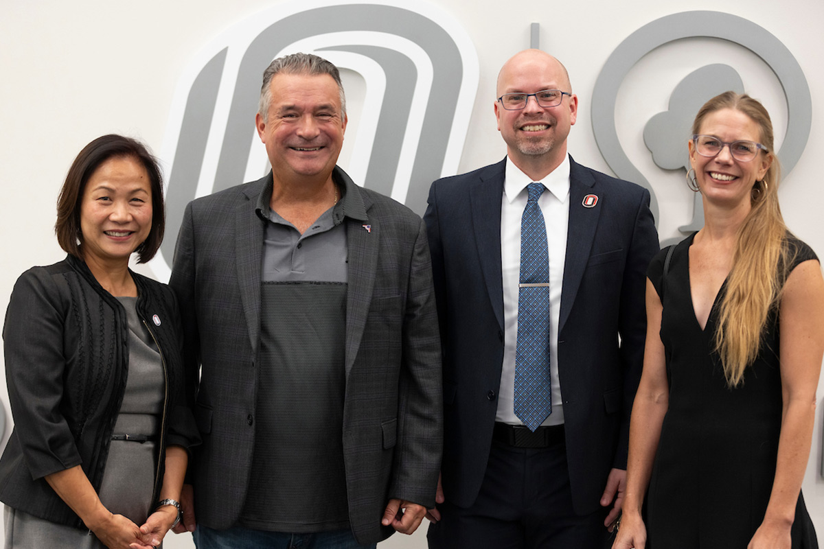 UNO Chancellor Joanne Li, Ph.D., U.S. Rep. Don Bacon, Director of the STEM Trail Center Chris Moore, Ph.D., and Omaha-based artist Lee Emma Running