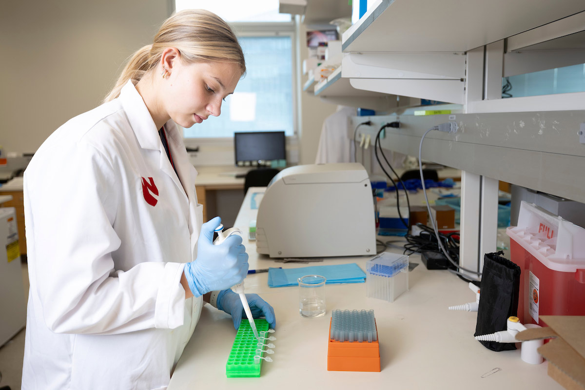 University of Nebraska at Omaha student Mollie Nielsen works as an intern in a lab at the University of Nebraska Medical Center.