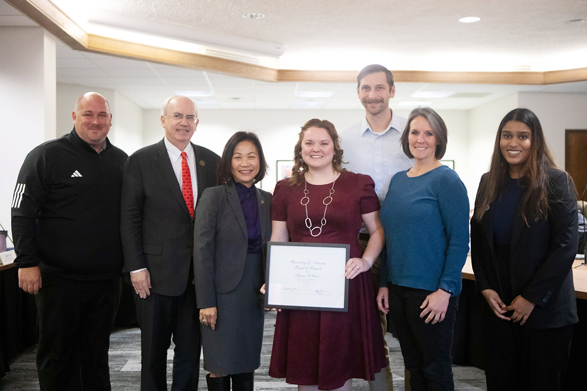 Pictured: Michael Smith, nominator; President Gold; Chancellor Li; Megan LeClair, recipient; Alan LeClair II, husband; supervisor and Assistant General Manager Cricket Gielle; and UNO Student Body President/Regent Adidam.