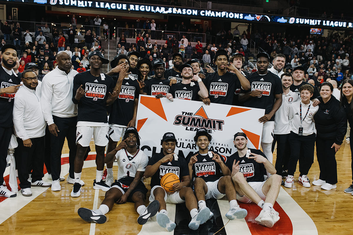 The champions celebrate at center court after the final buzzer.