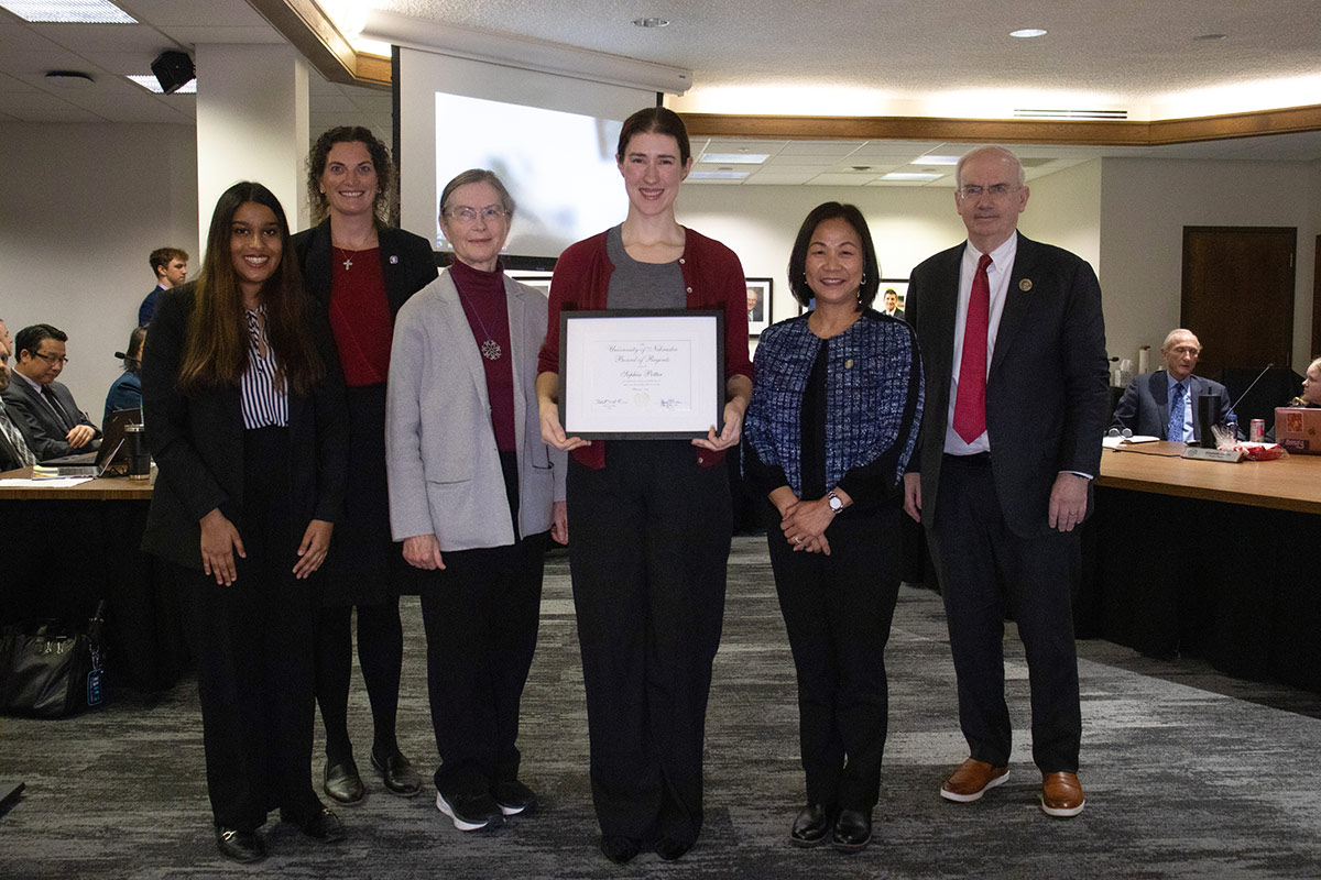 Pictured: Regent Adidam; Sara Myers, Associate Vice Chancellor for Research in the Office of Research and Creative Activity; Kathleen Johnson, mother; Sophia Potter, recipient; Chancellor Li, and President Gold.