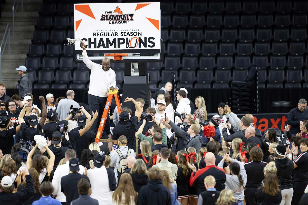 Omaha basketball coach Chris Crutchfield celebrates beating Oral Roberts University to win the Summit League Championship on Saturday, March 1, 2025, at Baxter Arena. UNO defeated ORU 80-57. Photo: Ryan Soderlin, Office of Strategic Marketing and Communications.