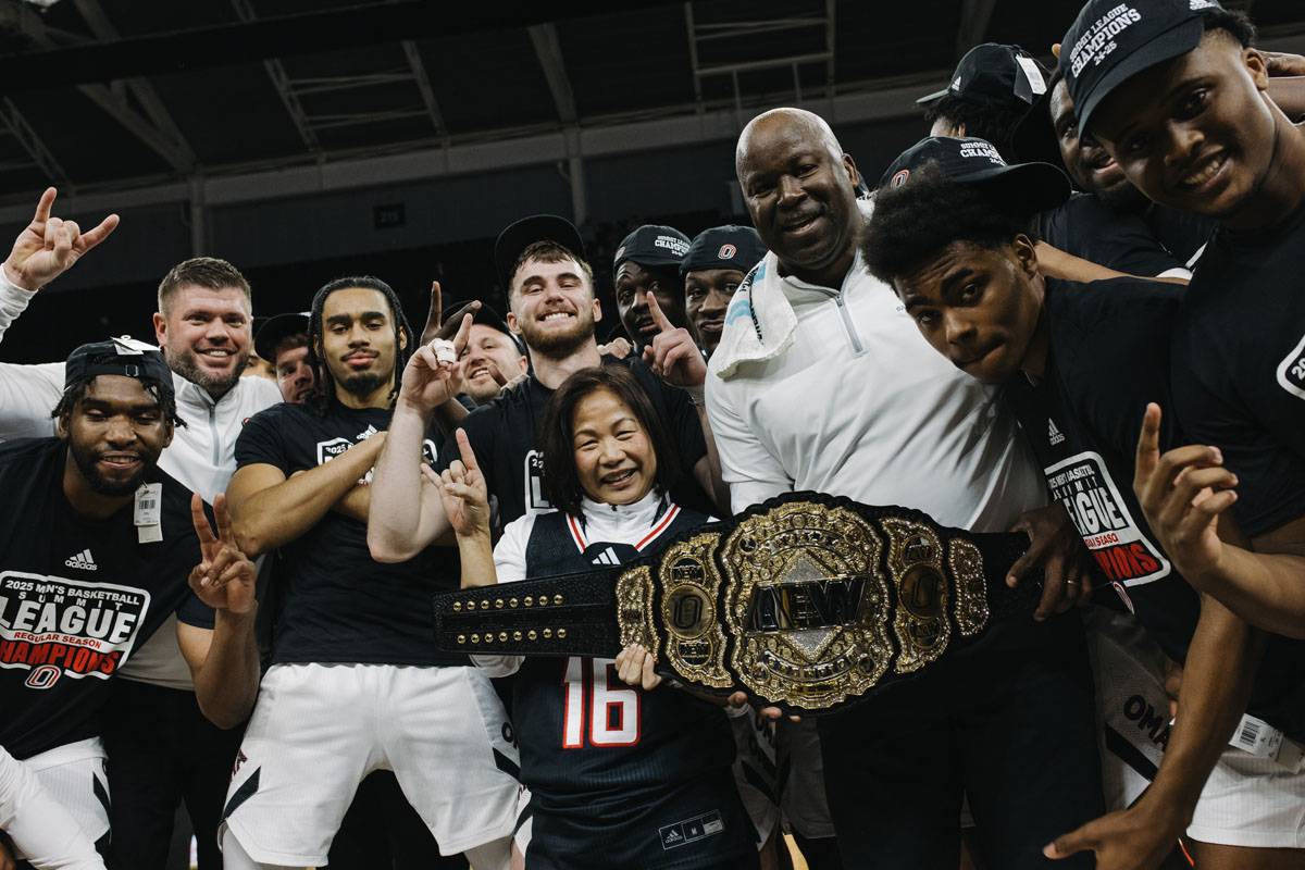 UNO Chancellor Joanne Li, Ph.D., CFA, joins the Omaha to celebrate its Summit League regular season championship. 