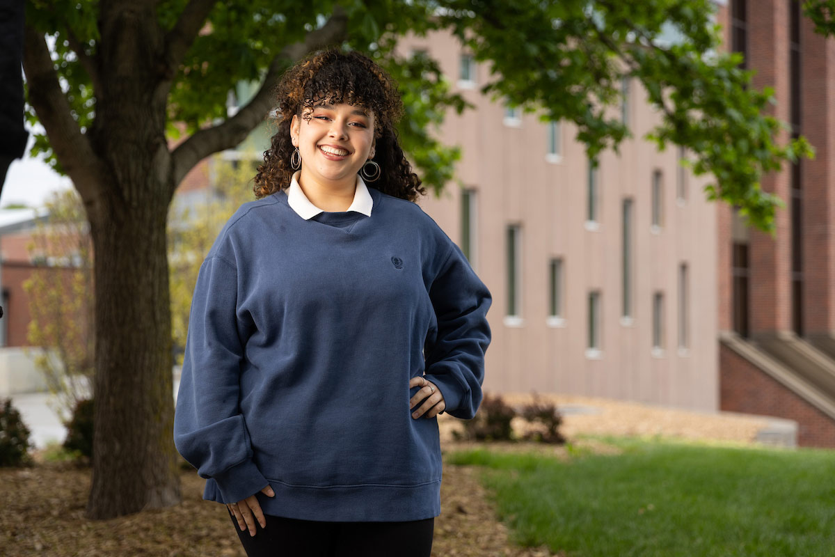 UNO College of Education, Health, and Human Sciences senior, Arlene Garcia, poses on campus.